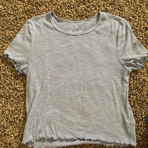 LIGHT BLUE BABY TEE WITH LETTUCE HEM